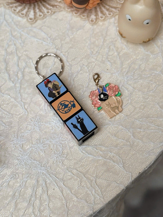 Kiki’s Delivery Service Flashlight Keychain & Jiji Necklace