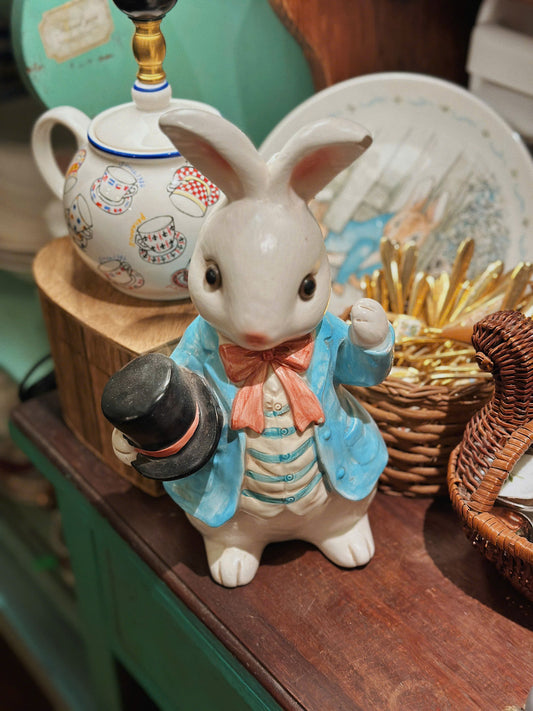 Cute rabbit statue with rattan basket