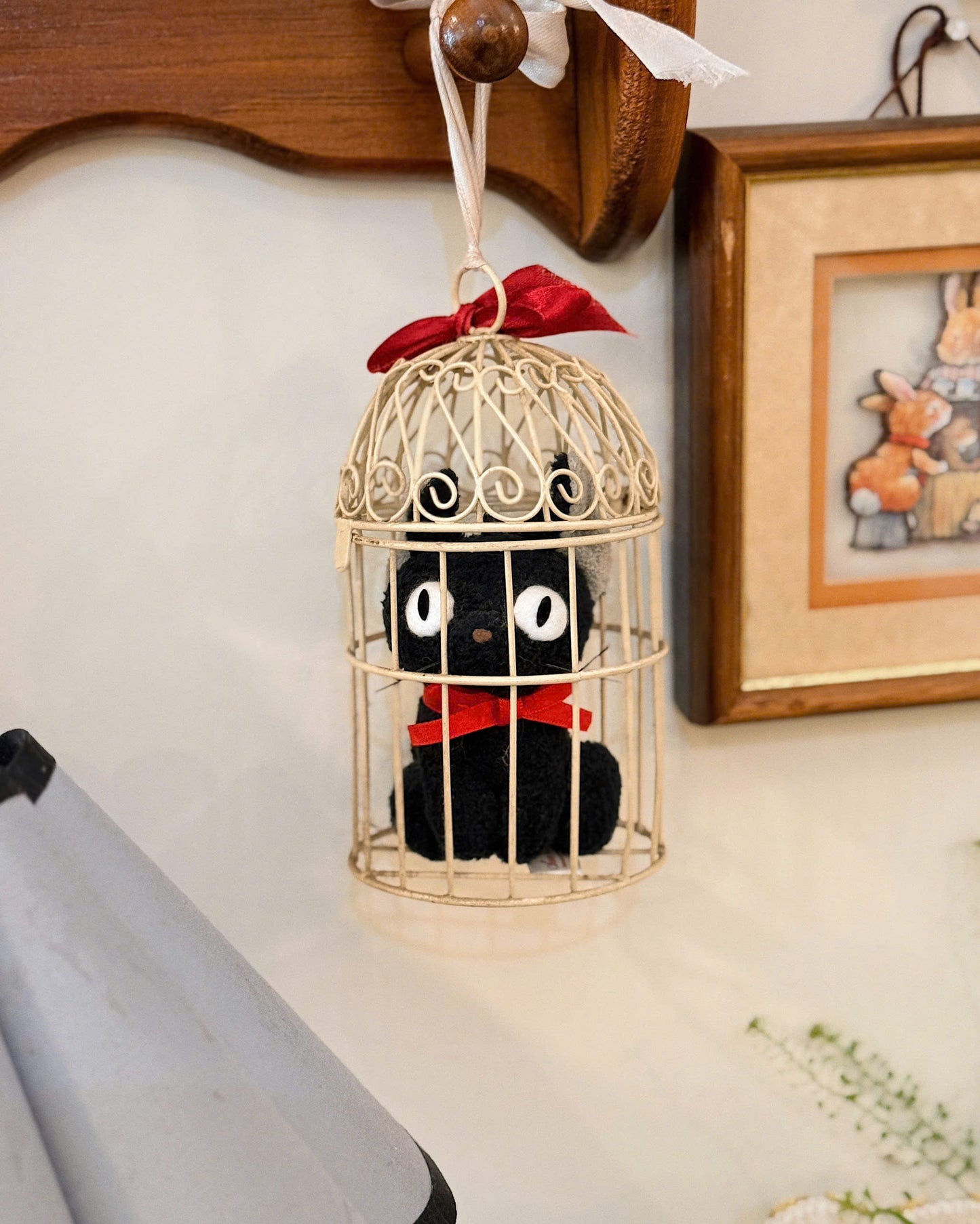 Jiji in a Litte Cage